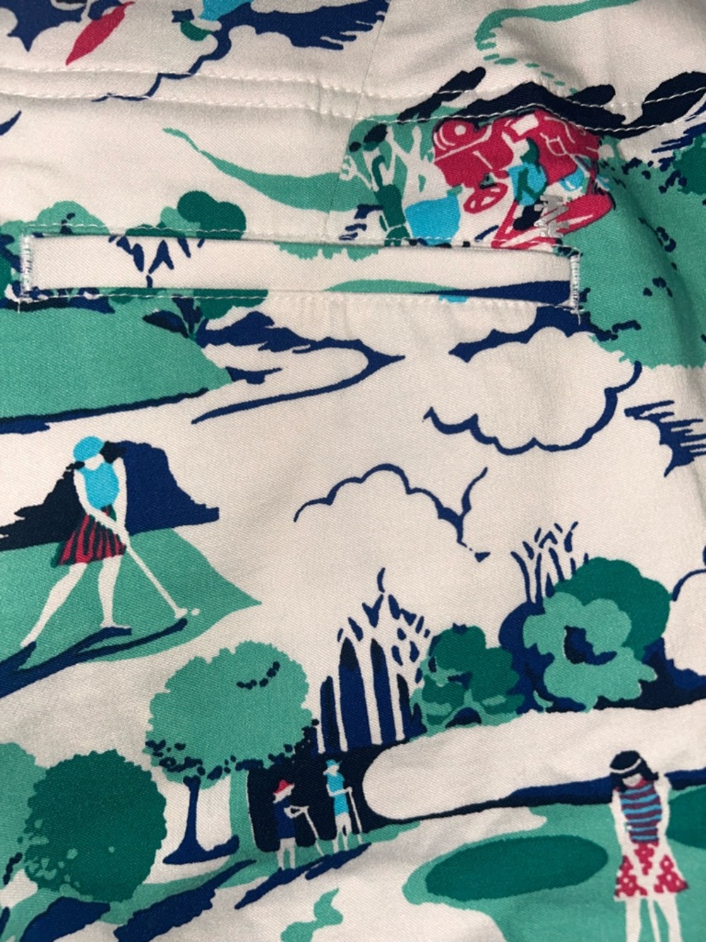 Izod White Golf-Scene Print Skort with Green and Navy Accents - Picture 6 of 6